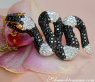 Spectacular Snake Pendant with Black and White Diamonds