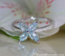 Delicate Aquamarin Blossom Style Ring with Diamonds