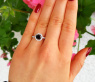 Pretty Black Diamond Solitaire Ring with White Diamonds