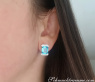 Attractive Blue Topaz Earrings with Diamonds