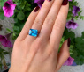 Striking Blue Topaz Ring with Sapphires