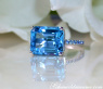 Striking Blue Topaz Ring with Sapphires