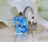 Striking Blue Topaz Ring with Sapphires