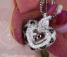 Unusual Black & White Diamond Heart Pendant Behind Glass