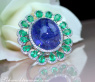 Opulent Tanzanite Ring with Diamonds and Emeralds