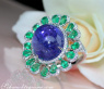 Opulent Tanzanite Ring with Diamonds and Emeralds