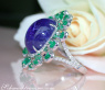 Opulent Tanzanite Ring with Diamonds and Emeralds