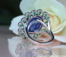 Opulent Tanzanite Ring with Diamonds and Emeralds