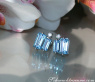 Delicate Baguette Cut Blue Topaz Stud Earrings with Diamonds