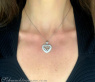 Tremendous Diamond Heart Pendant Behind Glass