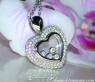 Tremendous Diamond Heart Pendant Behind Glass
