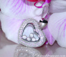 Tremendous Diamond Heart Pendant Behind Glass