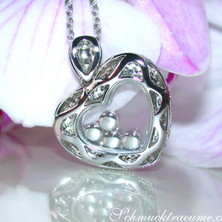 Tremendous Diamond Heart Pendant Behind Glass