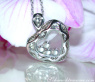 Tremendous Diamond Heart Pendant Behind Glass