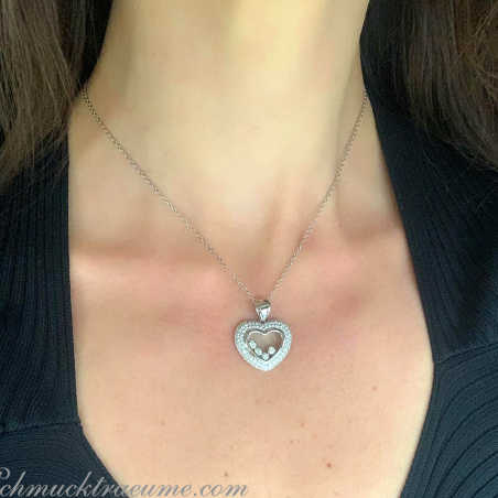 Tremendous Diamond Heart Pendant Behind Glass