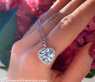 Delicate Aquamarine Heart Pendant with Diamonds