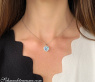 Delicate Aquamarine Heart Pendant with Diamonds