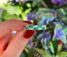 Exquisiter Bandring mit Smaragden und Brillanten