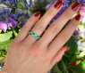 Exquisiter Bandring mit Smaragden und Brillanten