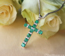 Smaragd Kreuz Anhänger mit Brillanten