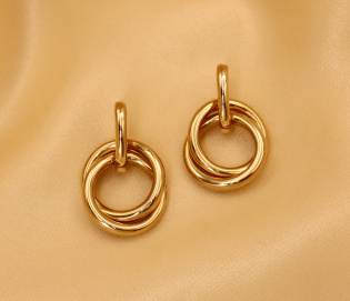 Gold Pur: Verschlungene Ohrringe in Gelbgold 585