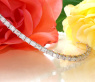 Exquisites Tennis Armband mit Diamanten im Smaragdschliff
