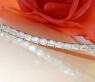 Exquisites Tennis Armband mit Diamanten im Smaragdschliff