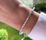 Exquisites Tennis Armband mit Diamanten im Smaragdschliff