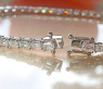 Exquisites Tennis Armband mit Diamanten im Smaragdschliff