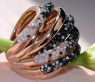 Opulent ring with black, natural brown & white diamonds