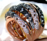 Opulent ring with black, natural brown & white diamonds