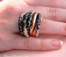 Opulent ring with black, natural brown & white diamonds