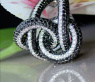 Entwined Black & White Diamond Ring