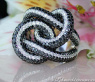 Entwined Black & White Diamond Ring
