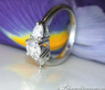 Feminine Diamond Solitaire Ring with Pear Shaped Diamonds