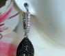 Interesting Black & White Diamond Teardrop Earrings