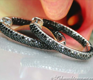 Oval hoop earrings with black diamonds