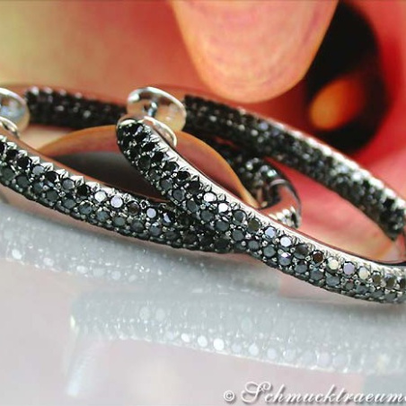 Oval hoop earrings with black diamonds