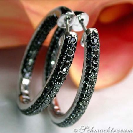 Oval hoop earrings with black diamonds