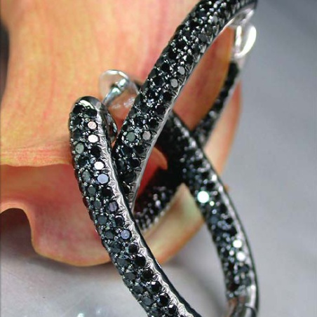 Oval hoop earrings with black diamonds