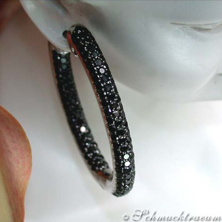 Oval hoop earrings with black diamonds