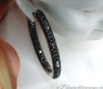 Oval hoop earrings with black diamonds