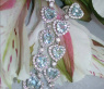 Glorious Dangling Earrings with Aquamarine Hearts
