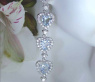 Glorious Dangling Earrings with Aquamarine Hearts