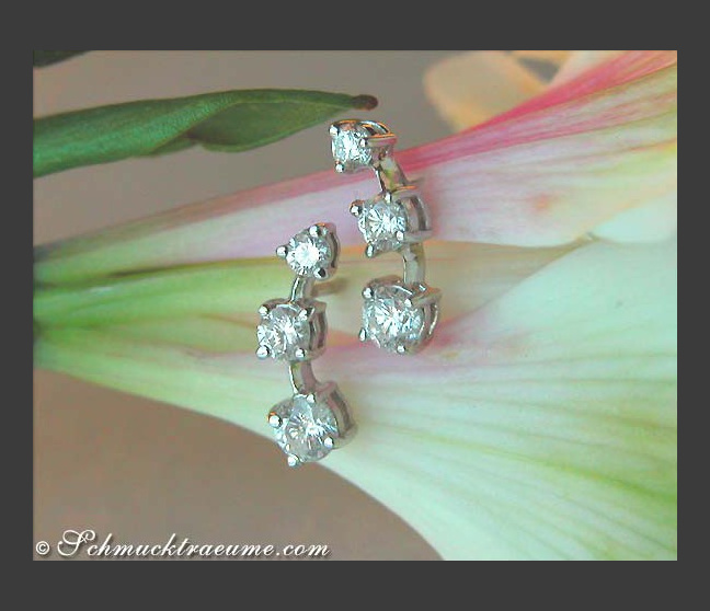 Pretty Three Diamond Solitaire Earrings Pretty Three Diamond Solitaire Earrings