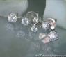 Pretty Three Diamond Solitaire Earrings