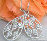Noble Diamond Dangle Earrings with Pear Shaped Diamonds