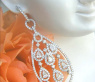 Noble Diamond Dangle Earrings with Pear Shaped Diamonds