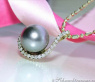Elegant Tahitian Pearl Pendant with Diamonds in Yellow gold