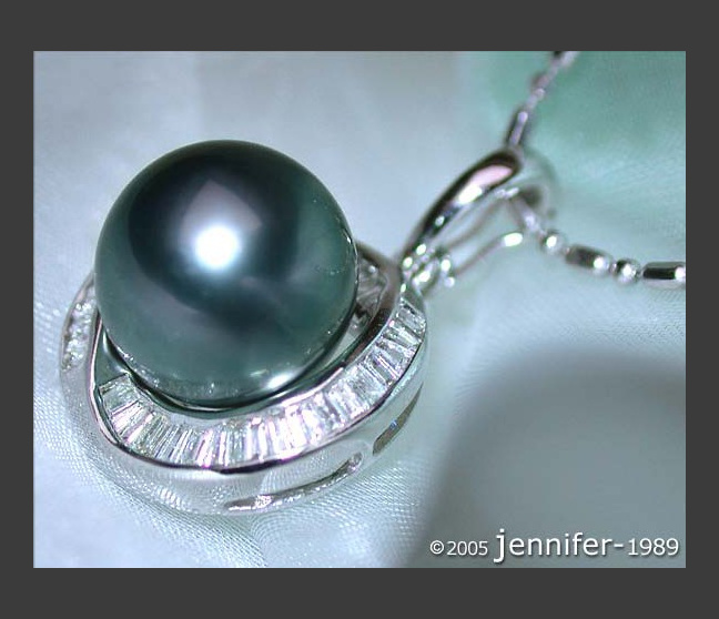 Enchanting Tahitian Pearl Pendant with Taper Diamonds Enchanting Tahitian Pearl Pendant with Taper Diamonds